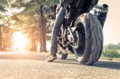 sport motorbike on the side of the road. Biker ready to run